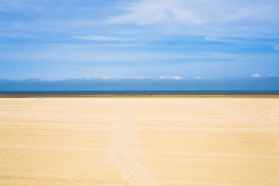 Wide Flat Sandy Beach In Normandy