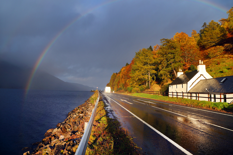 Road in autumn landscape, Highlands, Scotland, United Kingdom
